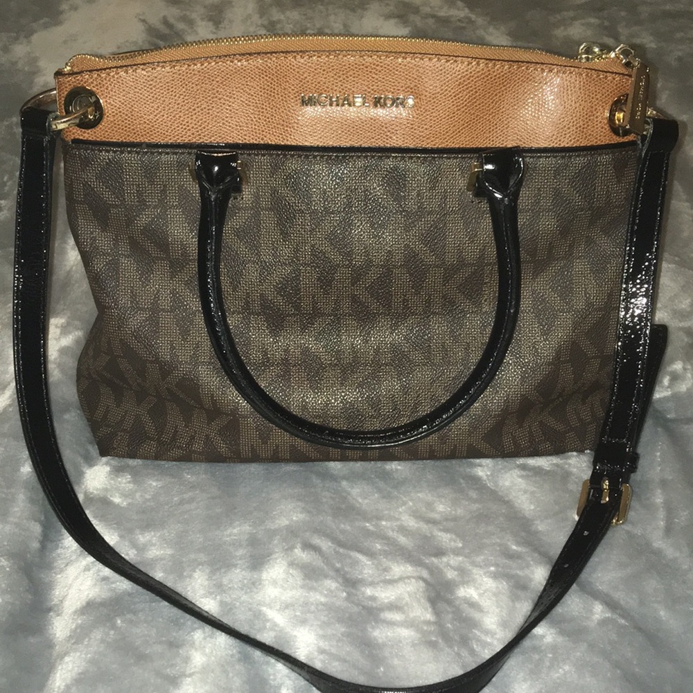 Michael Kors Brown and Tan Shoulder Bag with Gold Hardware
Minor pen marks